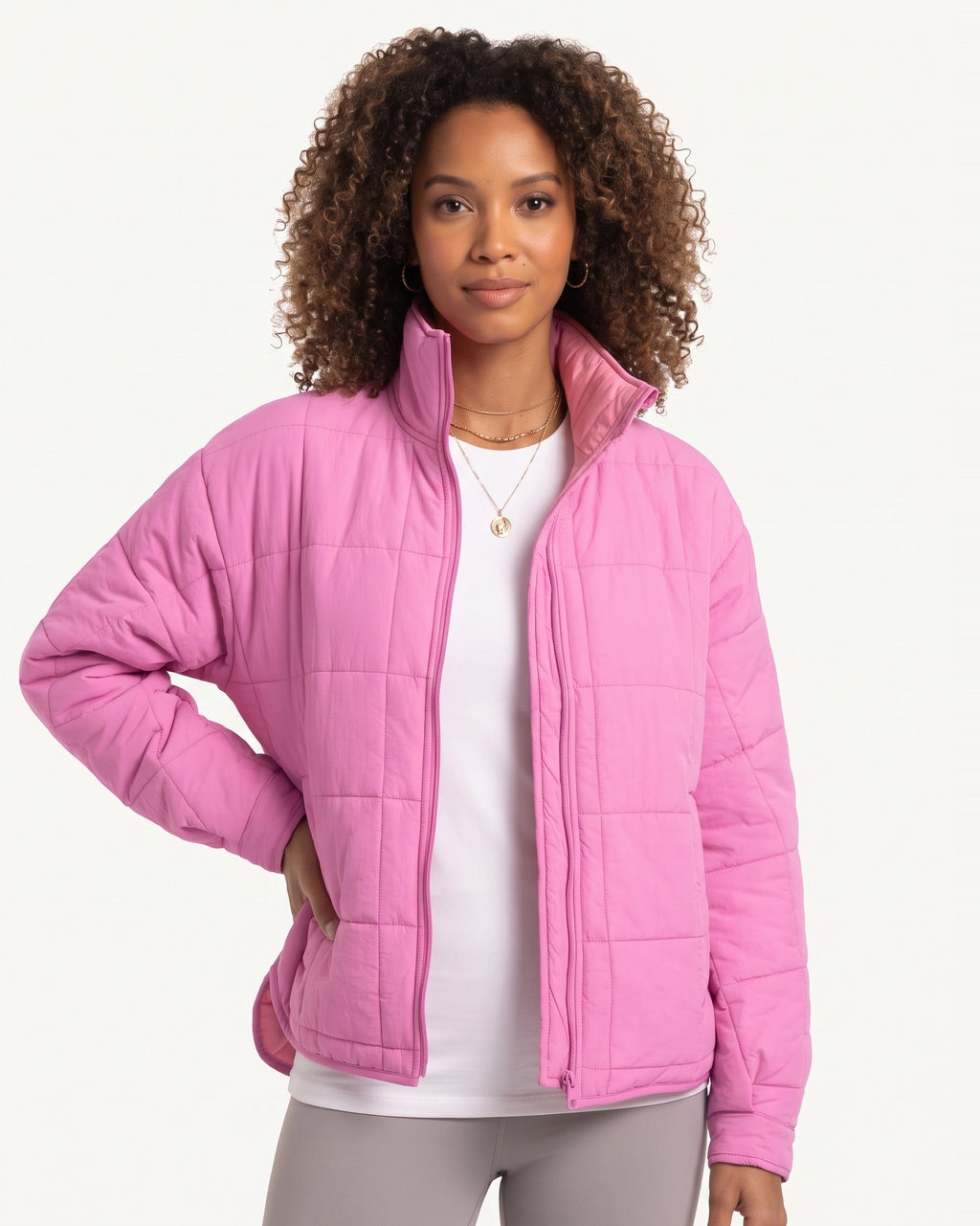 Bright pink lightweight quilted puffer jacket with stand collar and full-zip