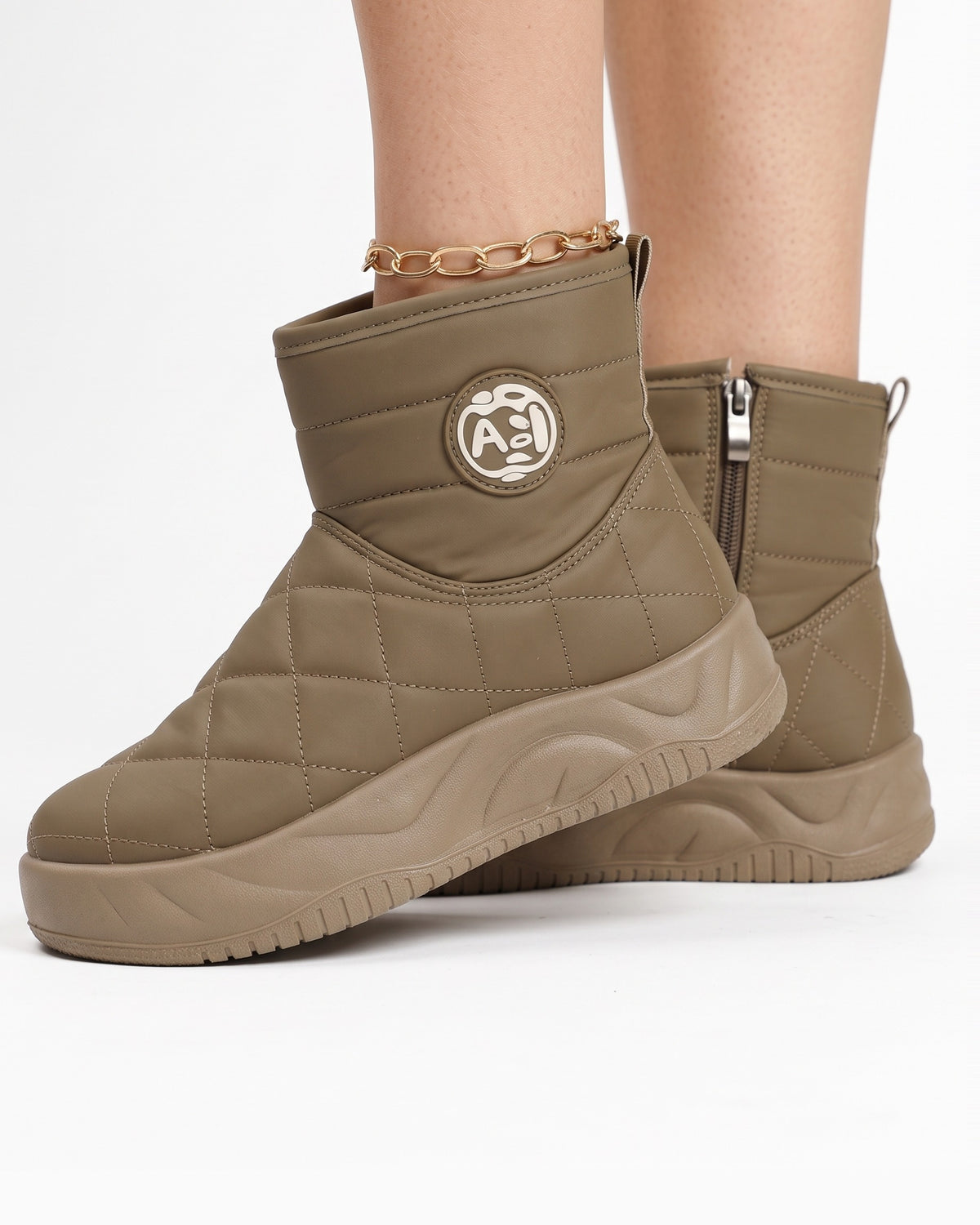 Quilted khaki platform ankle boots with side zip and fleece lining, logo patch