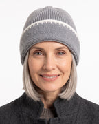 Gray ribbed knit beanie with white contrast stitch trim and folded cuff