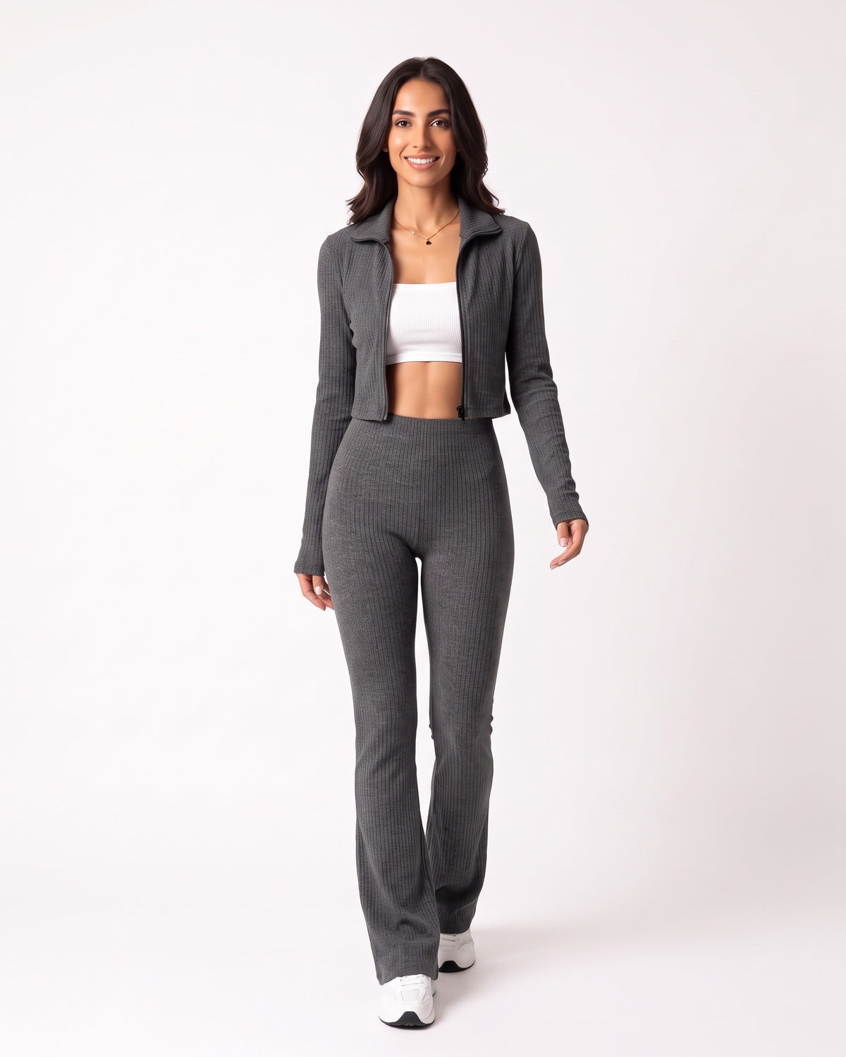 Dark gray ribbed knit lounge set with cropped zip jacket and high-waist flare pants.