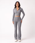 Gray ribbed knit lounge set with cropped zip jacket and high-waist flared pants