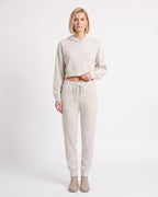 White cropped hoodie with kangaroo pocket and matching drawstring jogger pants set
