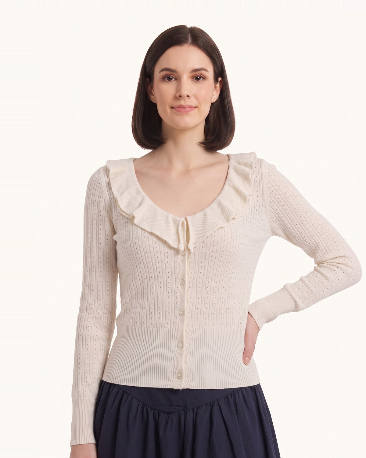 White knit cardigan with ruffle V-neck collar, button front, long sleeves