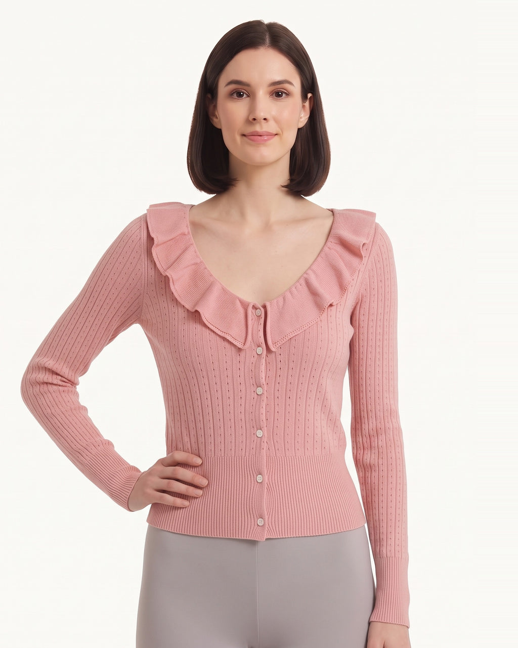 Pink cotton pointelle cardigan with ruffle V-neck collar and button front, fitted sleeves