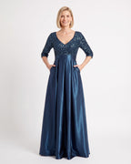 Dark blue satin ball gown with 3/4 sleeves, V-neck sequin bodice and full skirt