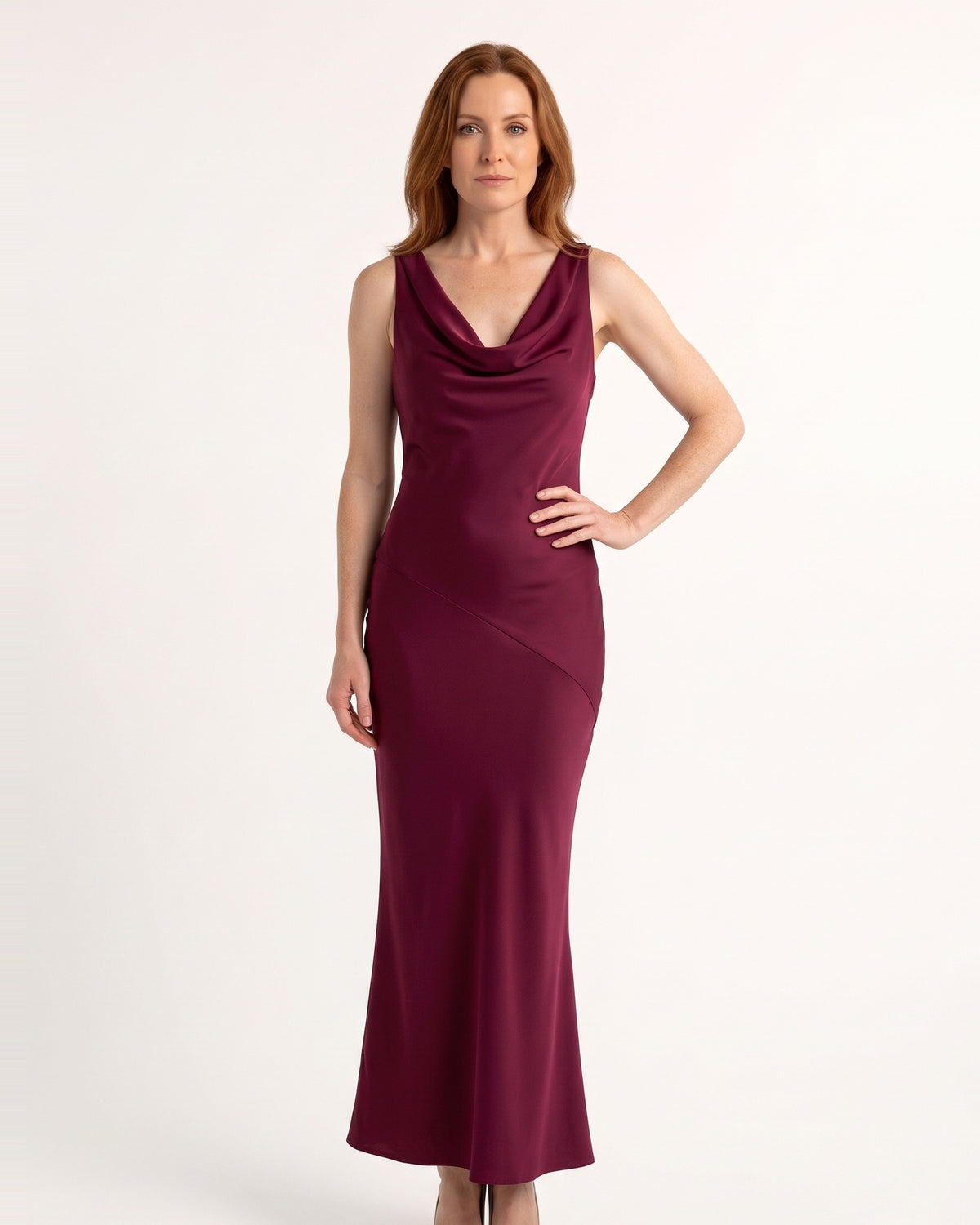 Burgundy satin maxi dress with sleeveless cowl neck and fitted column hem.