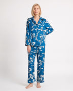 Women's satin pajama set with long-sleeve button shirt and straight pants; blue abstract stripe print