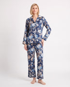 Women's satin pajama set with long-sleeve button shirt and straight pants; navy floral print