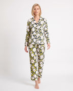 Women’s satin printed pajama set: long-sleeve notch collar shirt and matching pants.