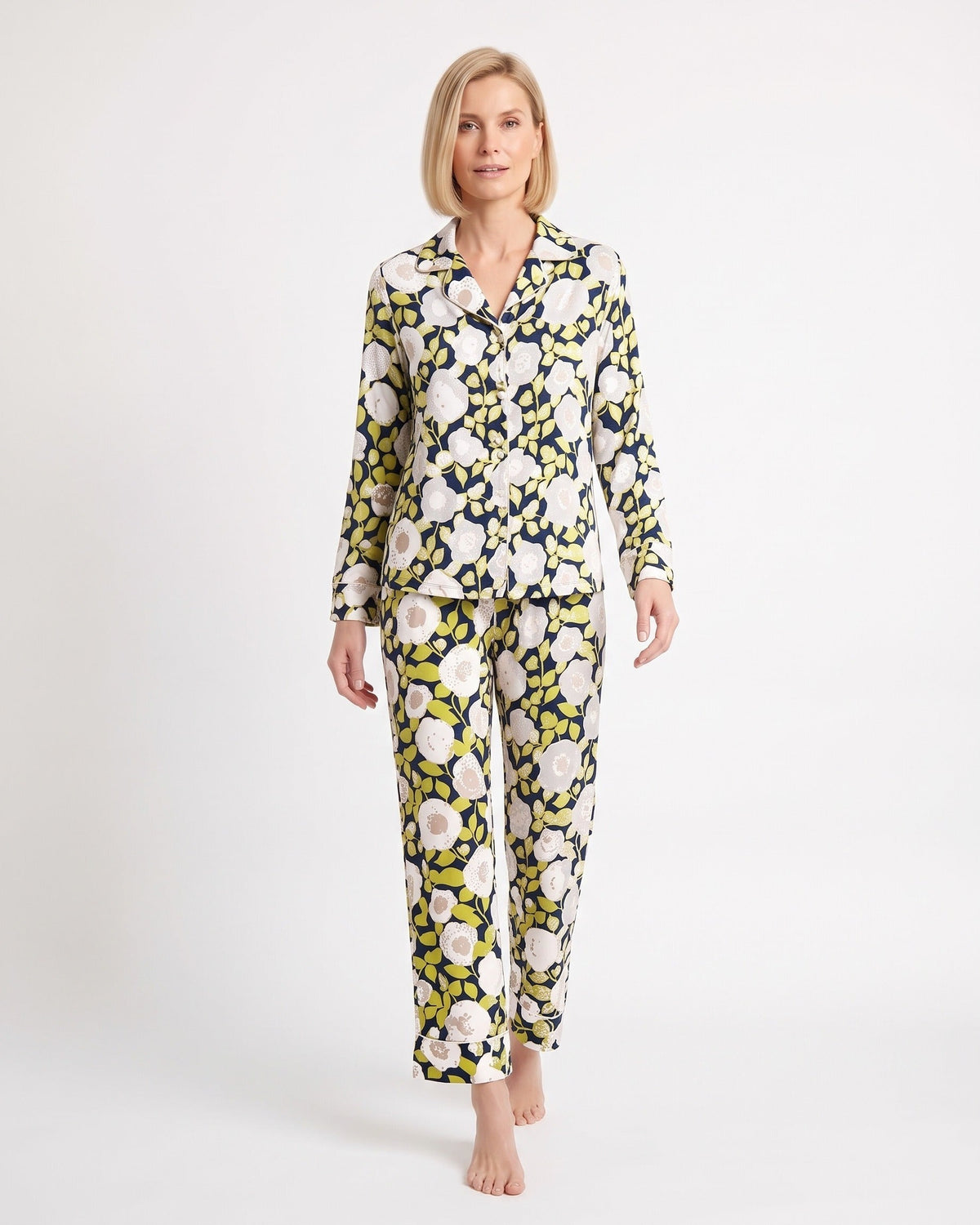 Women’s satin printed pajama set: long-sleeve notch collar shirt and matching pants.