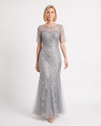 Gray sequin mermaid gown with leaf embroidery, sheer short sleeves, and a tulle maxi skirt