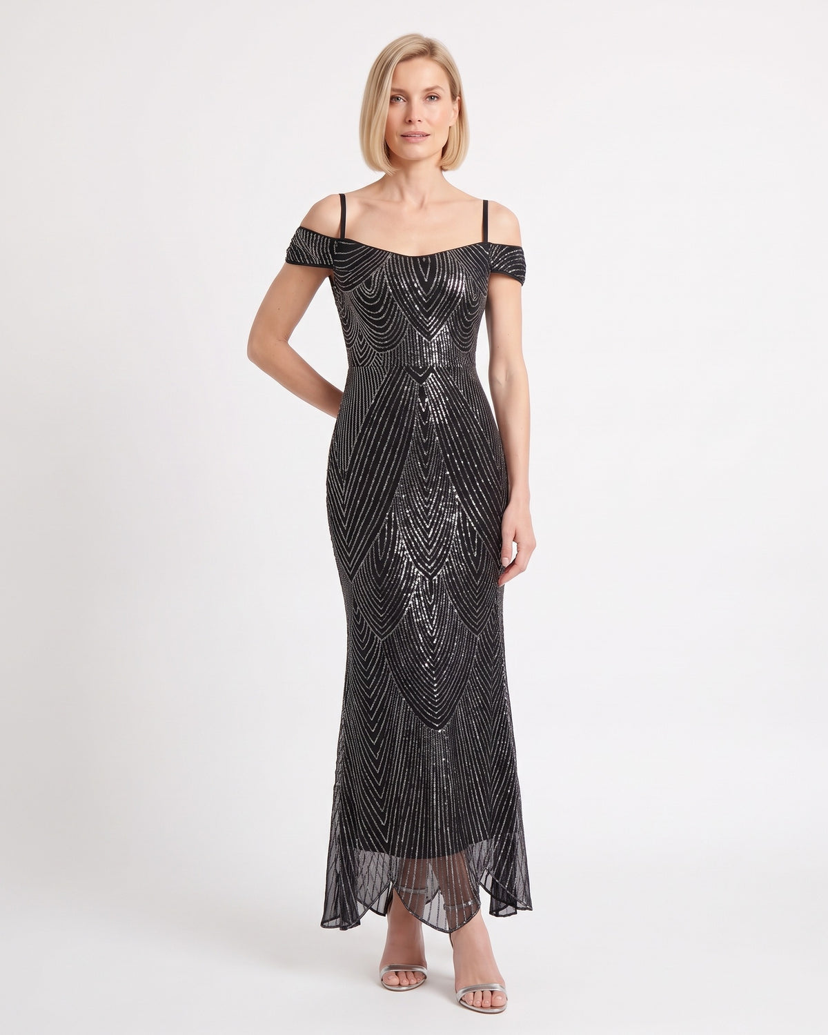 Black sequin mermaid maxi dress with off-shoulder neckline and fringe-style hem