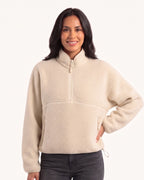 Women's sherpa half-zip fleece pullover in cream with stand collar and zip pocket
