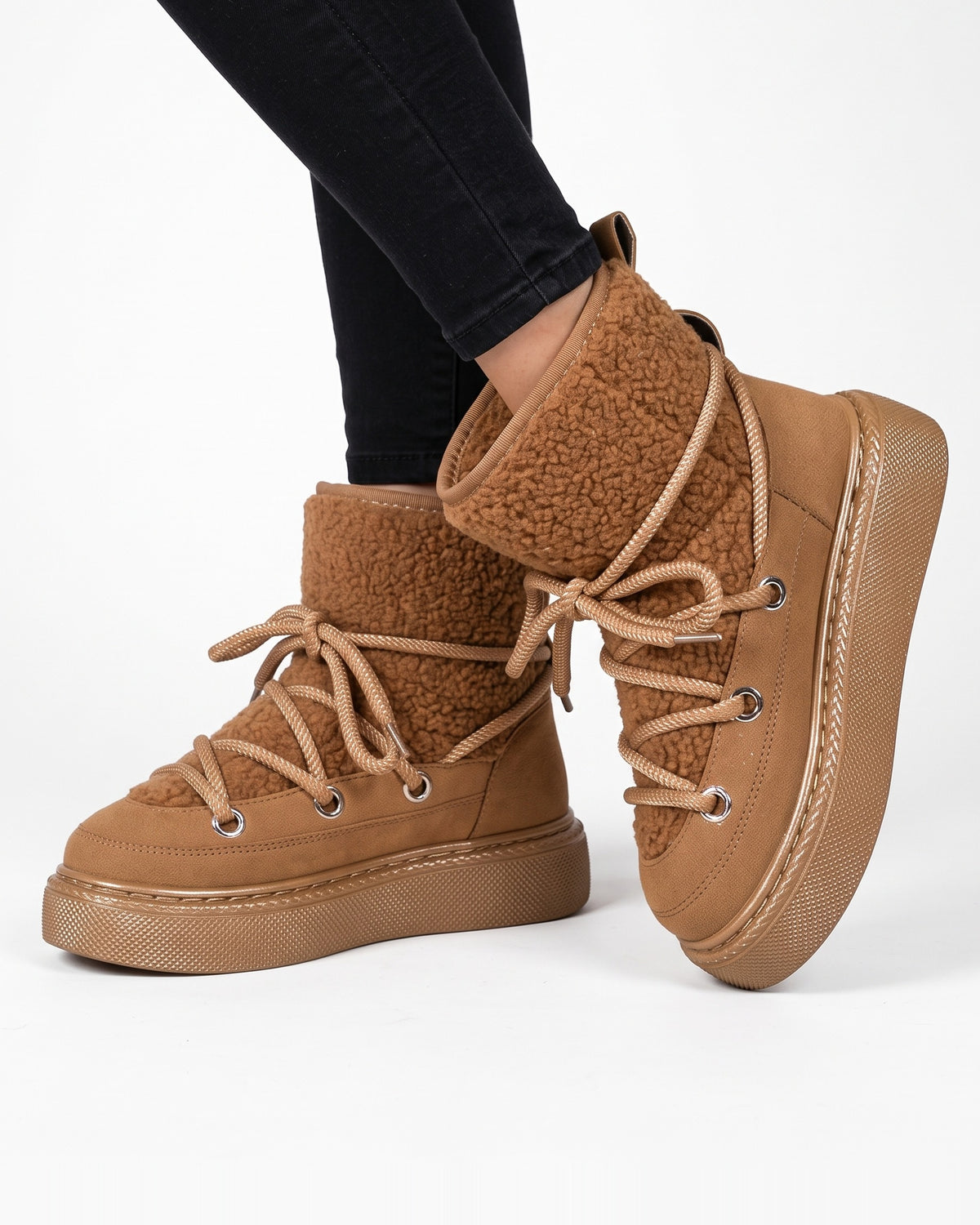 Camel lace-up platform snow boots with sherpa-lined cuff and chunky wrap-lace sole