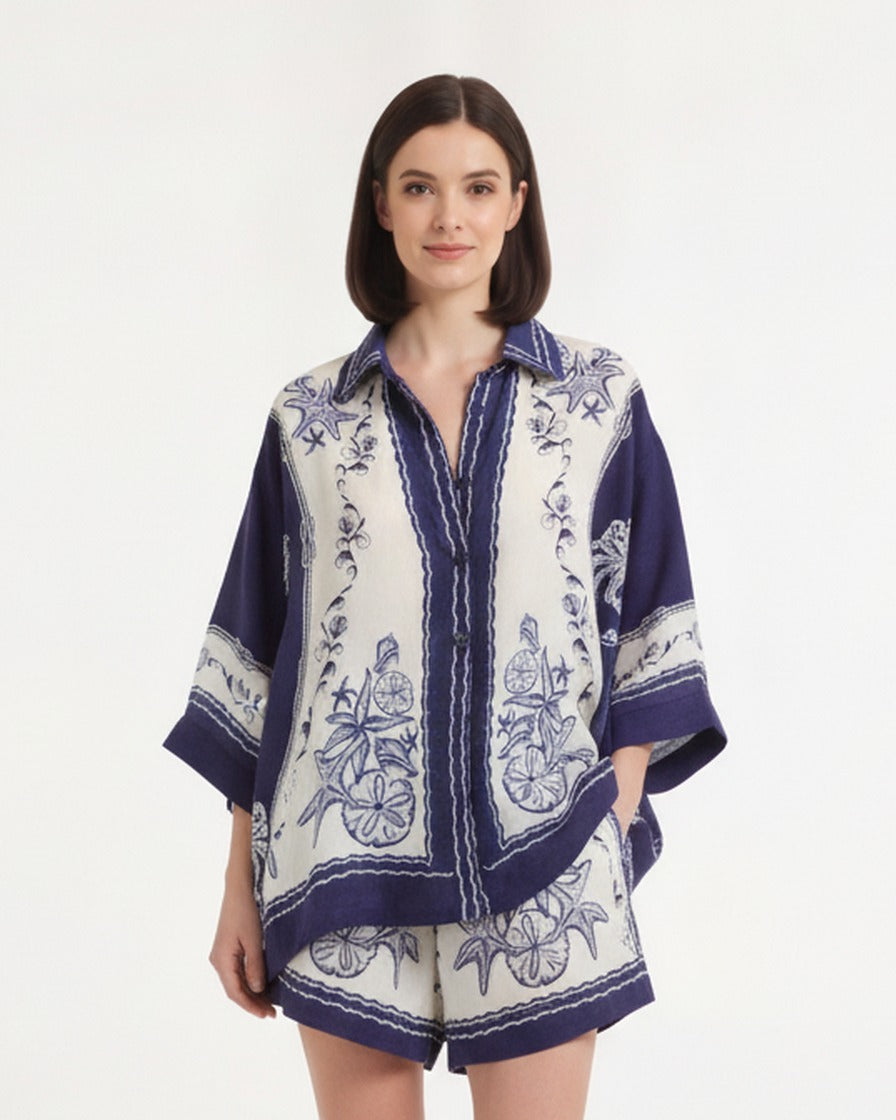 Women’s resort shirt and shorts set front, navy-and-white nautical print with contrast edging