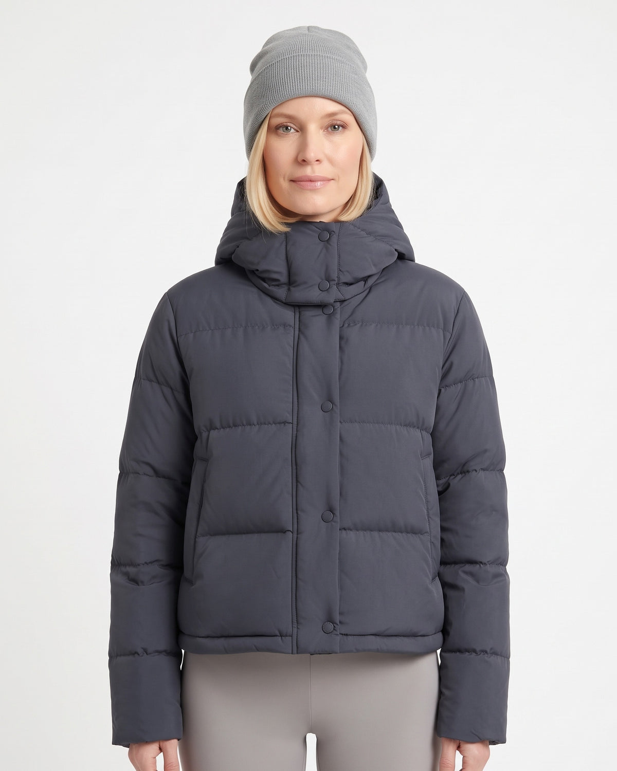 Cropped hooded puffer jacket in dark gray with snap-front closure and quilted panels