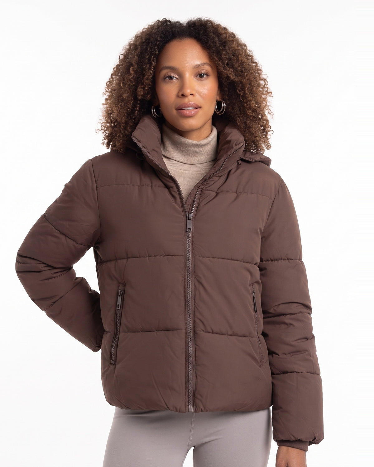 Brown hooded short puffer jacket with quilted panels and zip front
