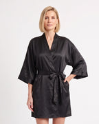 Short black satin robe with wide sleeves, tie belt, and side pockets