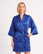Short blue satin robe with kimono sleeves, tie belt, and side pocket