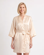 Cream satin robe with kimono sleeves and a waist tie