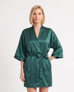 Dark green satin robe with wide sleeves and a tied belt