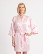 Short light pink satin robe with wide sleeves and a matching tie belt