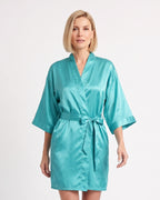 Turquoise satin robe with wide sleeves and a tied belt