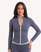 Gray-blue slim-fit workout jacket with stand collar, full zip, and cream contrast piping.