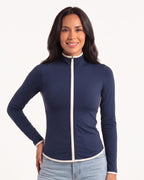 Navy slim-fit workout jacket with stand collar, full zip, and cream contrast piping.