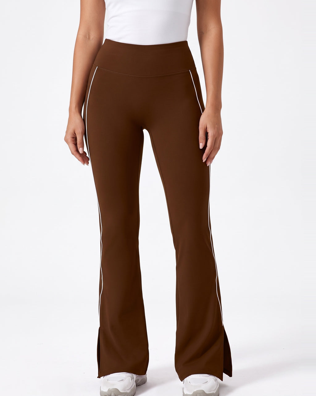 Brown high-waisted flare leggings with split hem and contrast piping