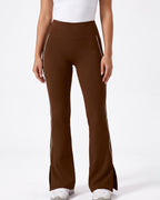Brown high-waisted flare leggings with split hem and contrast piping