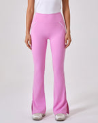 Pink high-waisted flare leggings with split hem and contrast piping