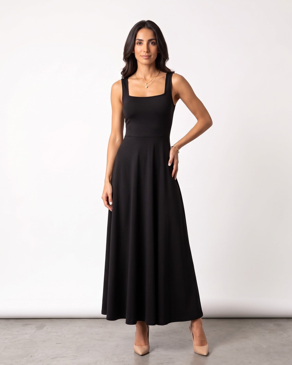 Black square-neck sleeveless maxi dress with wide straps, A-line flare silhouette