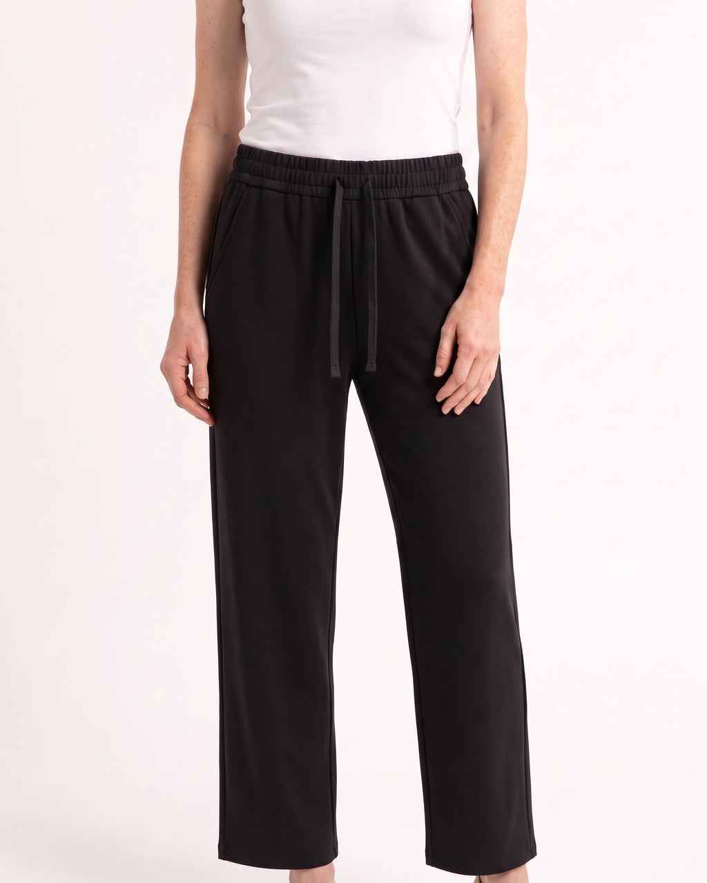 Women's black drawstring sweatpants with wide straight legs and elastic waistband