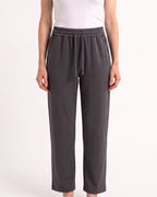 Women's dark gray drawstring sweatpants with wide straight legs and elastic waistband