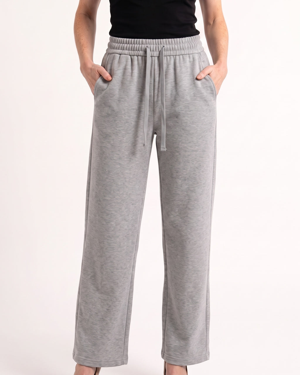 Women's gray drawstring sweatpants with wide straight legs and elastic waistband