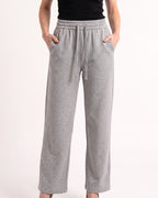 Women's gray drawstring sweatpants with wide straight legs and elastic waistband