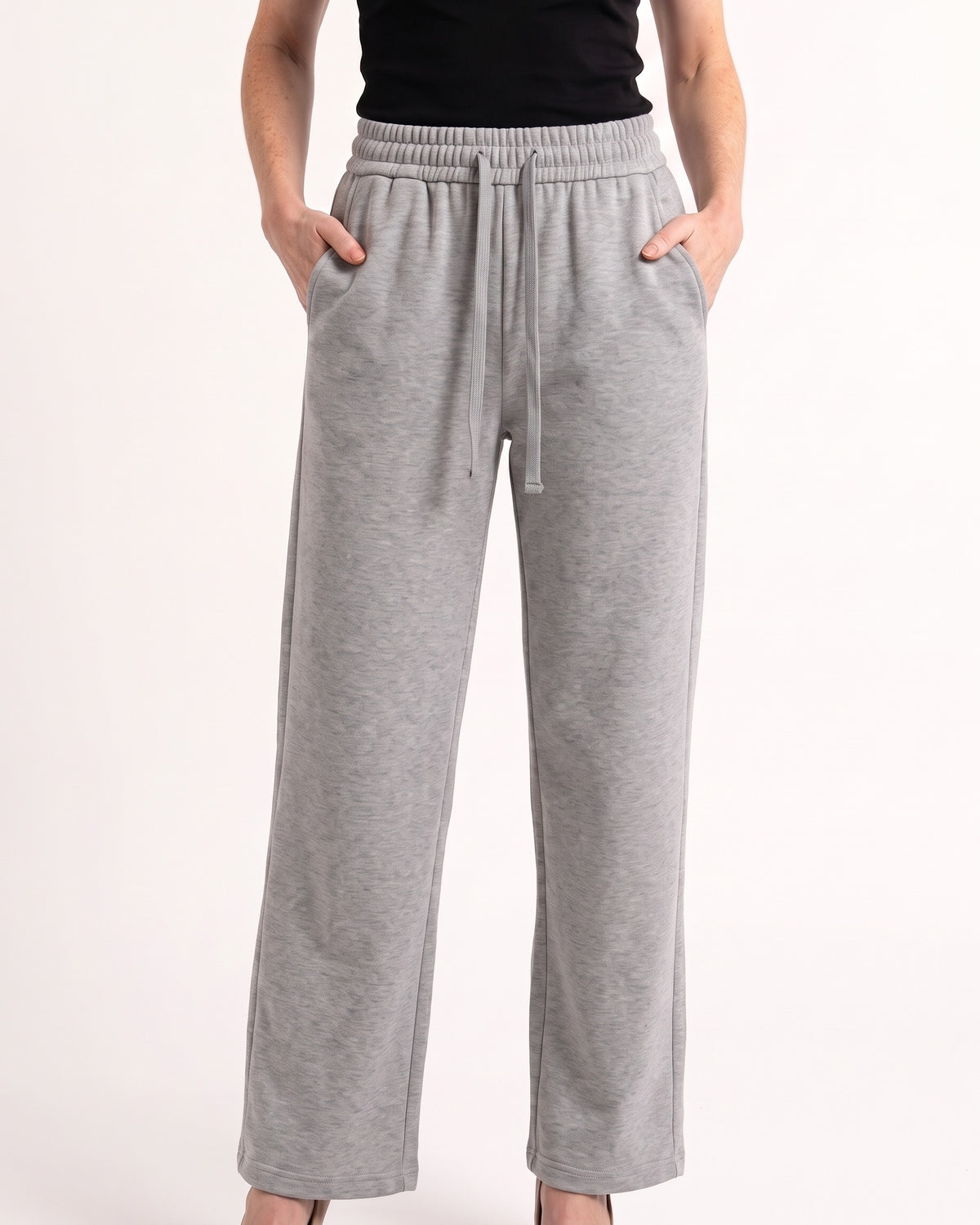 Women's gray drawstring sweatpants with wide straight legs and elastic waistband