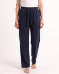 Women's navy drawstring sweatpants with wide straight legs and elastic waistband