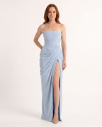Light blue strapless maxi dress with ruched draped bodice and high slit
