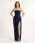 Strapless navy maxi dress with ruched bodice, draped wrap skirt and high front slit