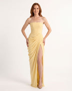 Yellow strapless maxi dress with ruched draped bodice and high slit