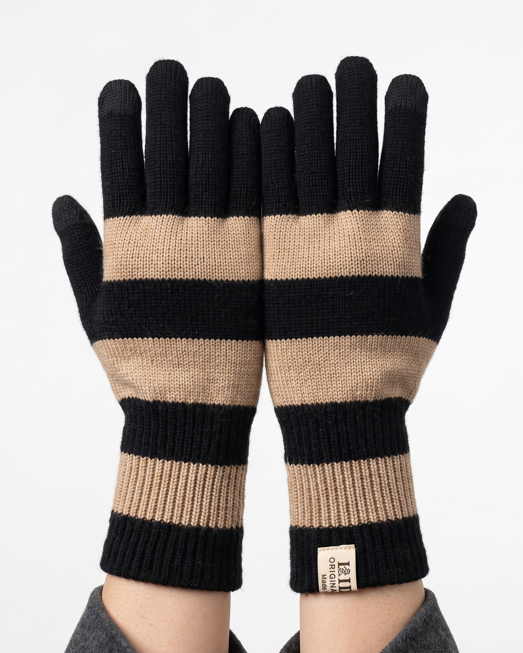 Striped knit gloves with long ribbed cuffs, black with beige and tan stripes