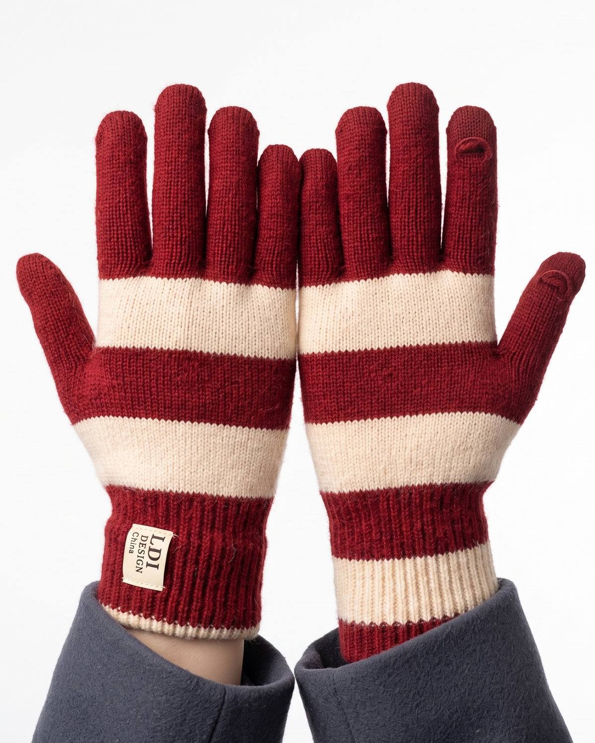 Striped knit gloves with long ribbed cuffs, red and cream stripes with brand label