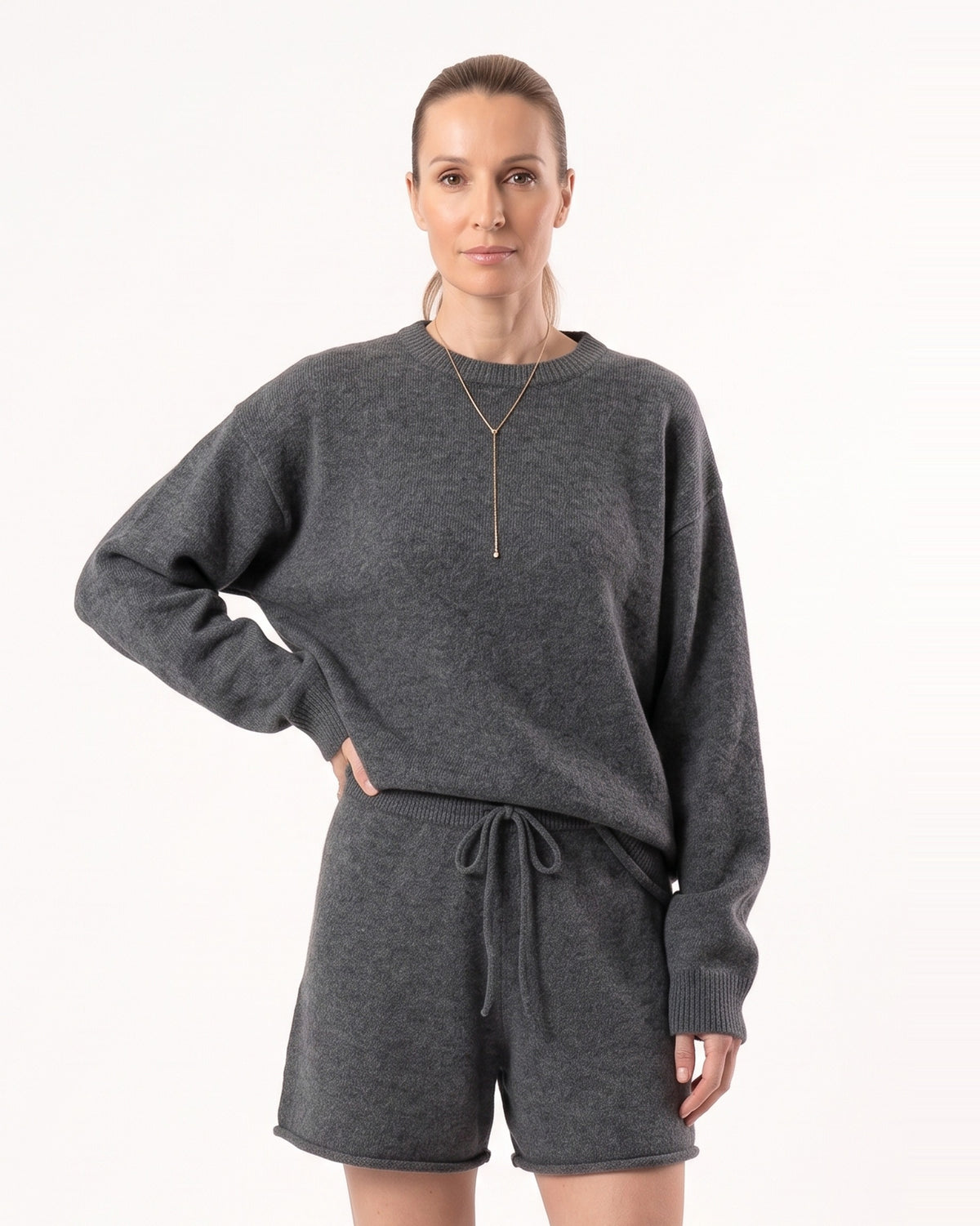 Women’s charcoal knit pullover with V-neck trim and matching drawstring shorts set