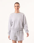 Light gray women’s fleece sweatshirt and matching drawstring shorts lounge set