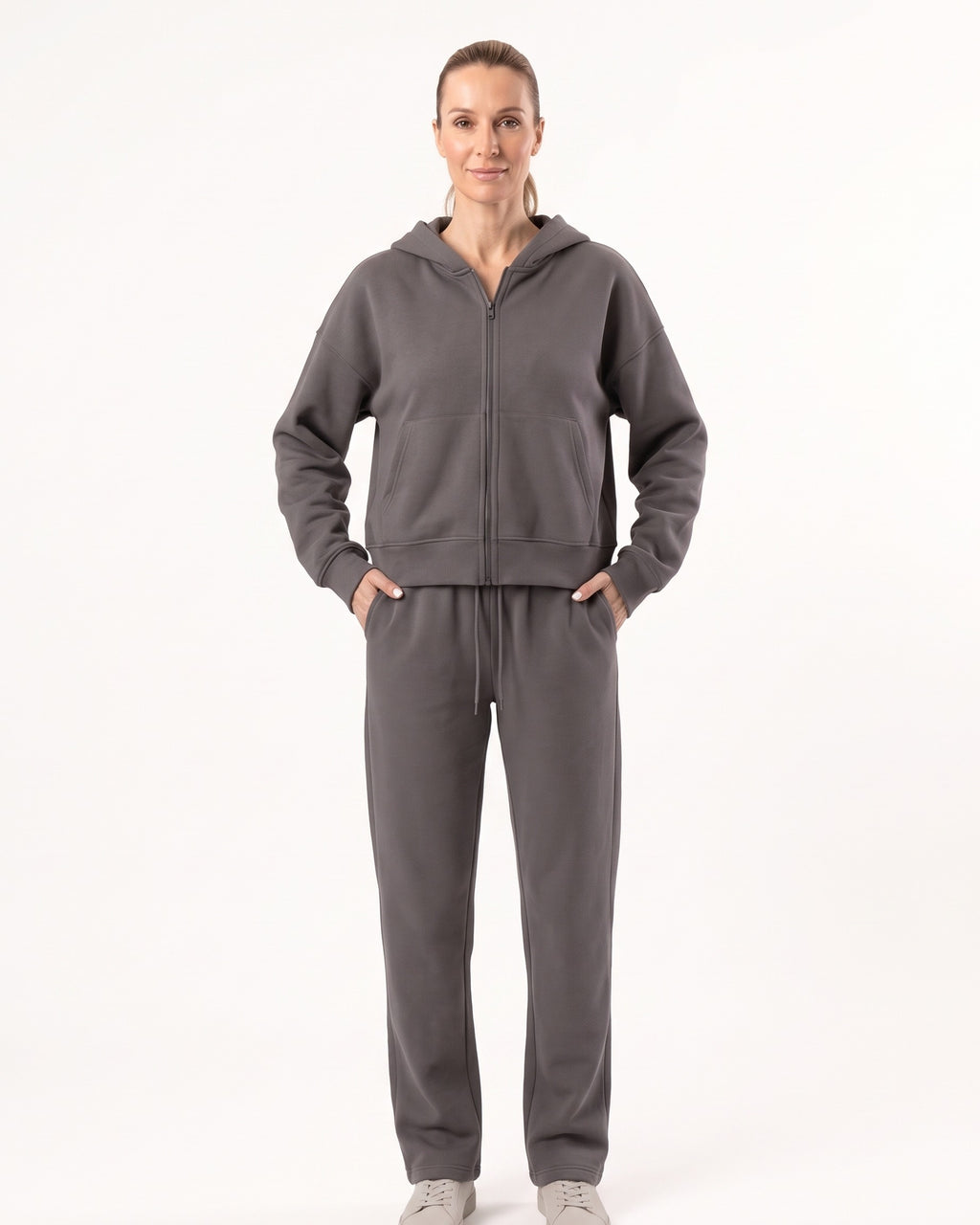 Dark gray zip-front hoodie and drawstring sweatpants set, full length