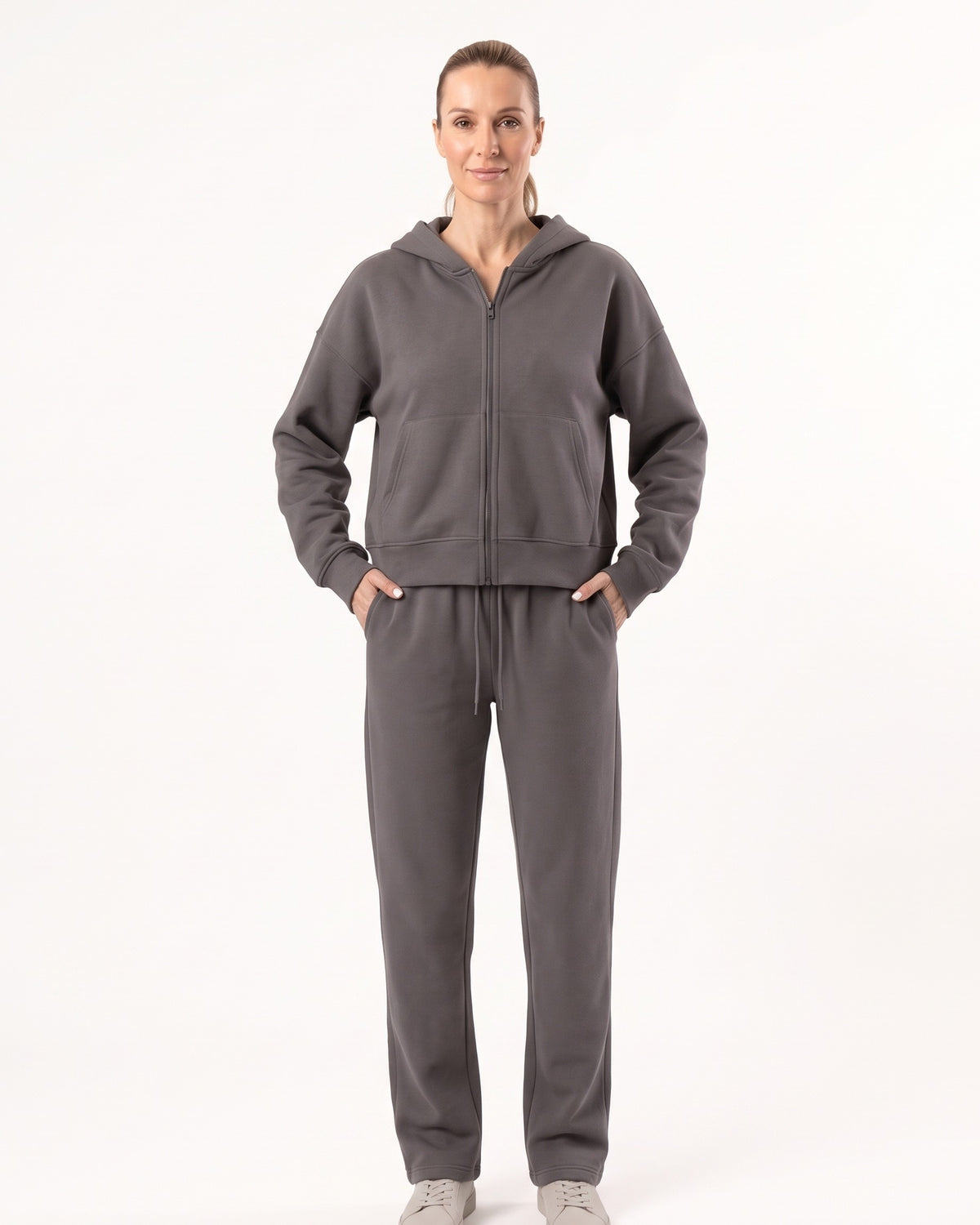 Dark gray zip-front hoodie and drawstring sweatpants set, full length