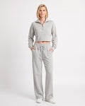 Light gray sweatsuit with collared cropped half-zip top and wide-leg drawstring pants