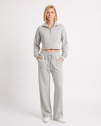 Light gray sweatsuit with collared cropped half-zip top and wide-leg drawstring pants